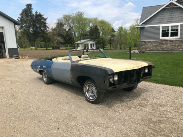 Blue 1969 Chevrolet Impala Convertible with White interior