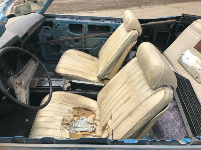 Blue 1969 Chevrolet Impala Convertible with White interior