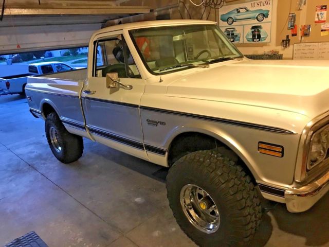 White 1970 Chevrolet C-10 pick up with Green interior