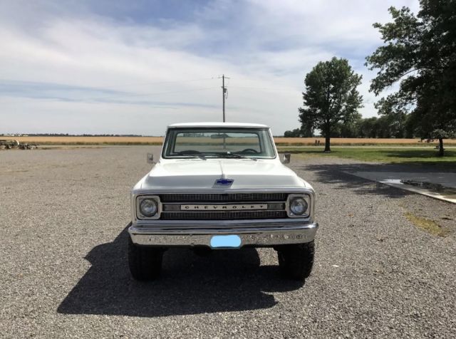 White 1970 Chevrolet C-10 pick up with Green interior