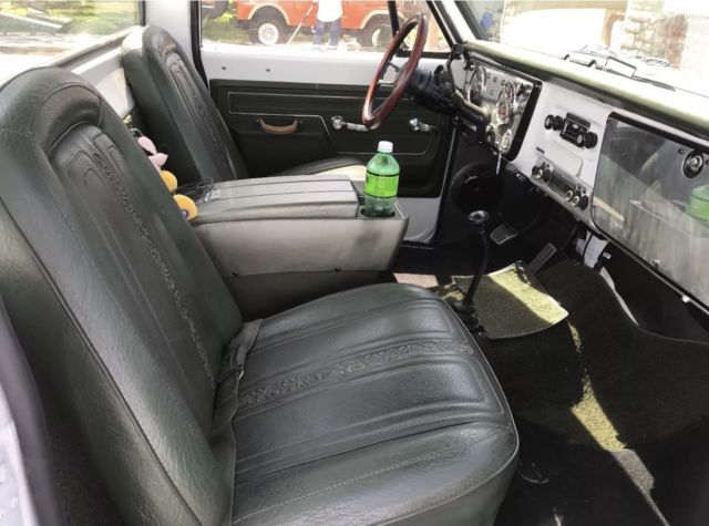 White 1970 Chevrolet C-10 pick up with Green interior