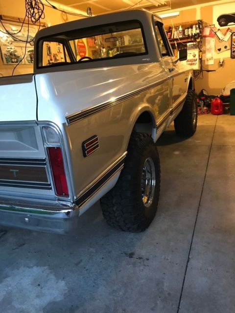 White 1970 Chevrolet C-10 pick up with Green interior