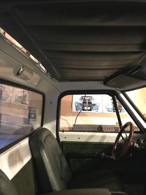 White 1970 Chevrolet C-10 pick up with Green interior