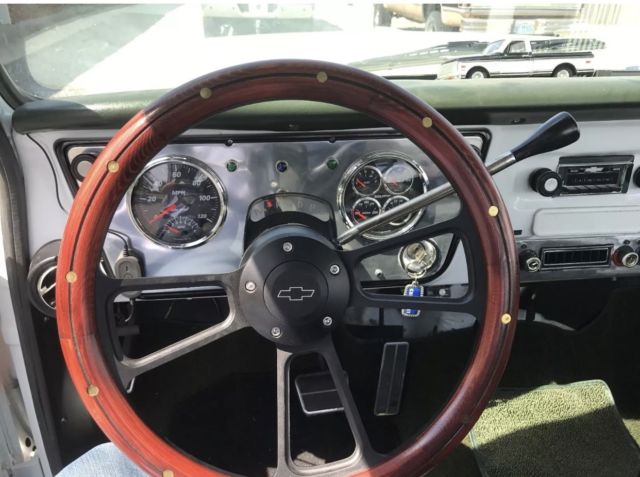 White 1970 Chevrolet C-10 pick up with Green interior