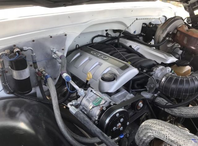 White 1970 Chevrolet C-10 pick up with Green interior