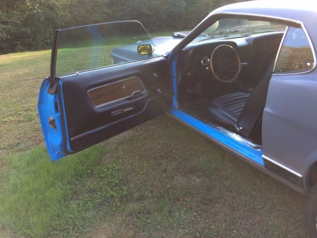 Gray 1970 Ford Mustang Fastback with Black interior