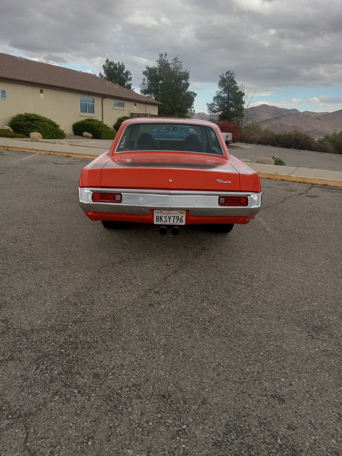 Orange 1971 Plymouth Scamp Coupe with Black interior