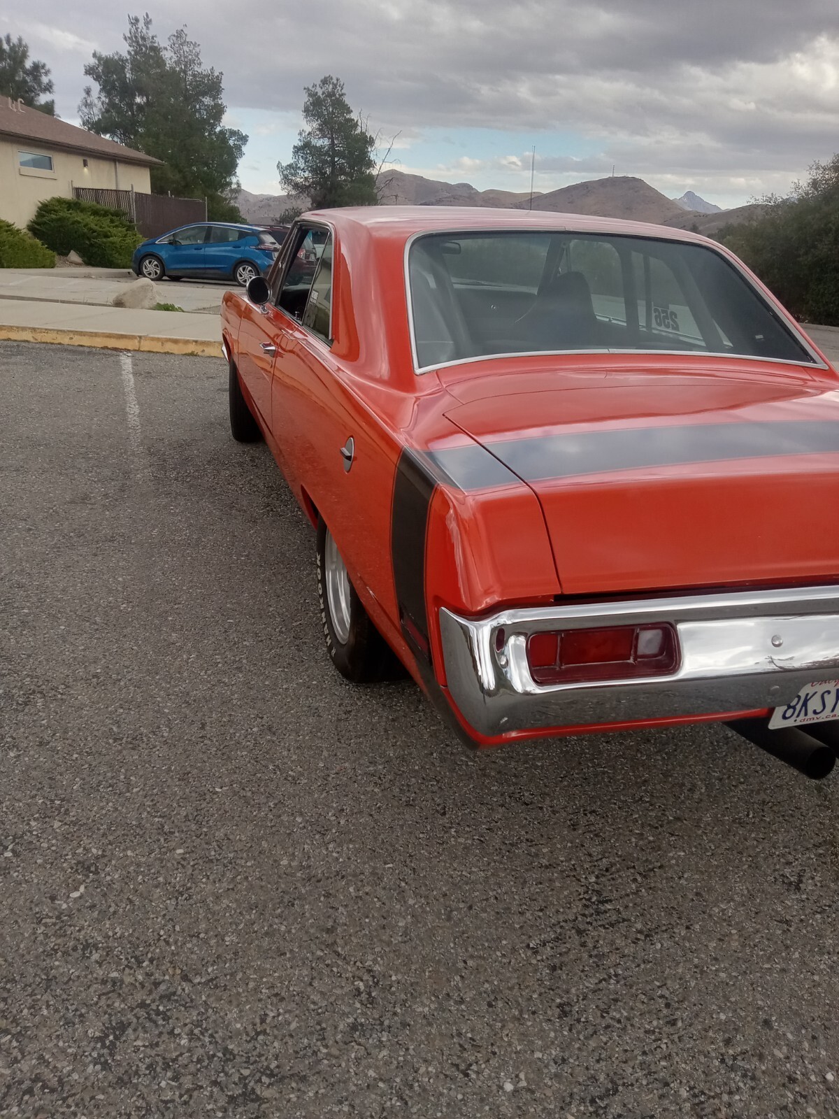 Orange 1971 Plymouth Scamp Coupe with Black interior