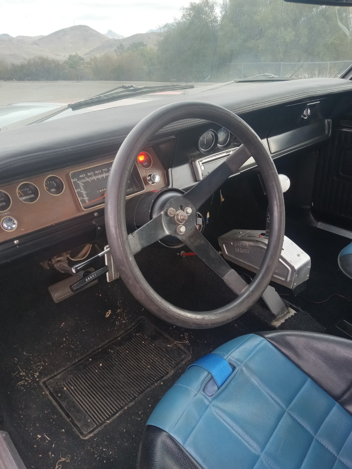 Orange 1971 Plymouth Scamp Coupe with Black interior
