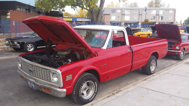 Red 1972 Chevrolet C-10 reg cab with orange /white interior
