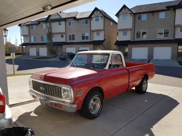Red 1972 Chevrolet C-10 reg cab with orange /white interior