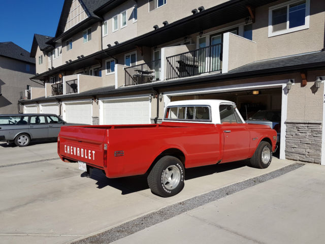 Red 1972 Chevrolet C-10 reg cab with orange /white interior