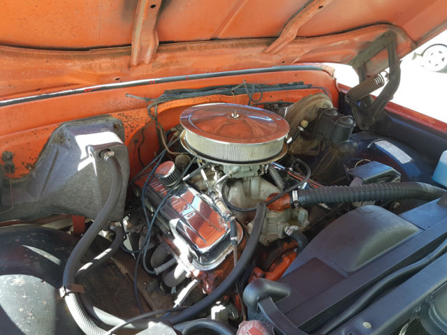Red 1972 Chevrolet C-10 reg cab with orange /white interior