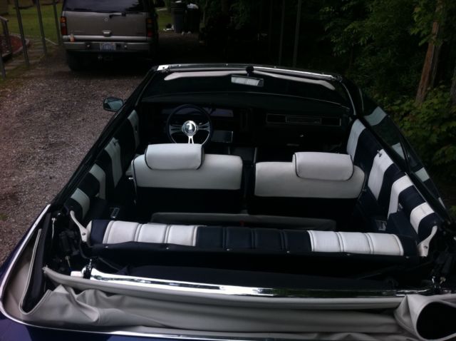Blue 1972 Chevrolet Impala Convertible with blue and white interior