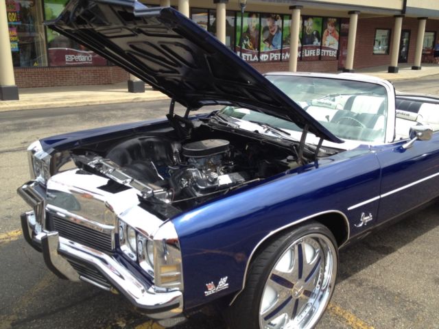 Blue 1972 Chevrolet Impala Convertible with blue and white interior