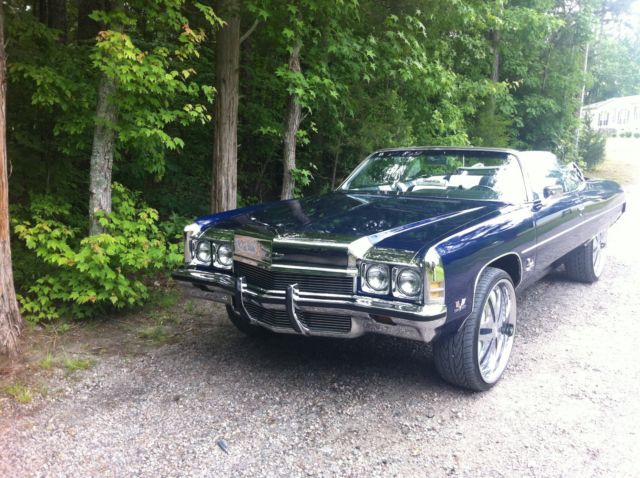 Blue 1972 Chevrolet Impala Convertible with blue and white interior
