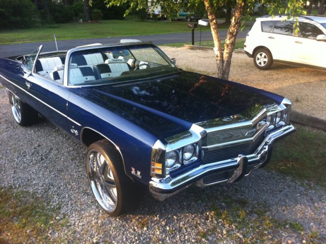 Blue 1972 Chevrolet Impala Convertible with blue and white interior