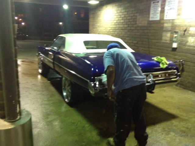 Blue 1972 Chevrolet Impala Convertible with blue and white interior