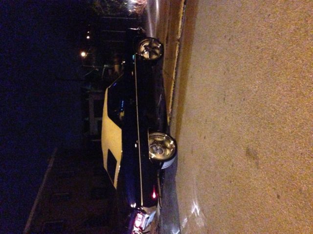 Blue 1972 Chevrolet Impala Convertible with blue and white interior