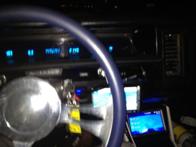 Blue 1972 Chevrolet Impala Convertible with blue and white interior