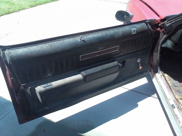 Maroon/silver 1973 Chevrolet Chevelle Coupe with Black interior