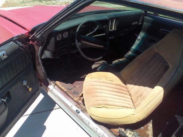Maroon/silver 1973 Chevrolet Chevelle Coupe with Black interior