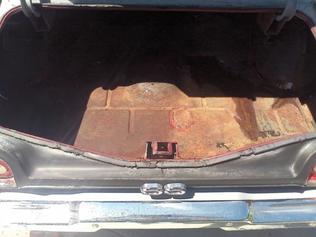 Maroon/silver 1973 Chevrolet Chevelle Coupe with Black interior
