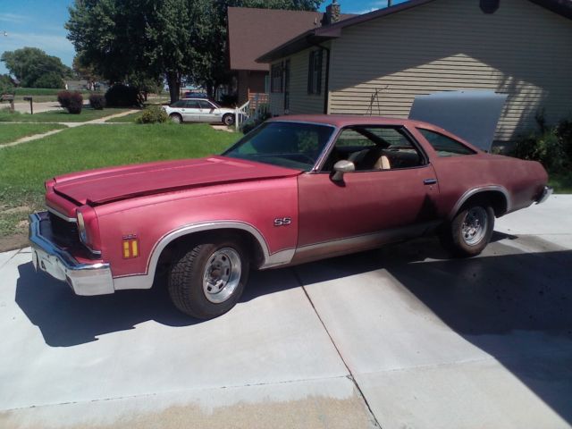 Maroon/silver 1973 Chevrolet Chevelle Coupe with Black interior