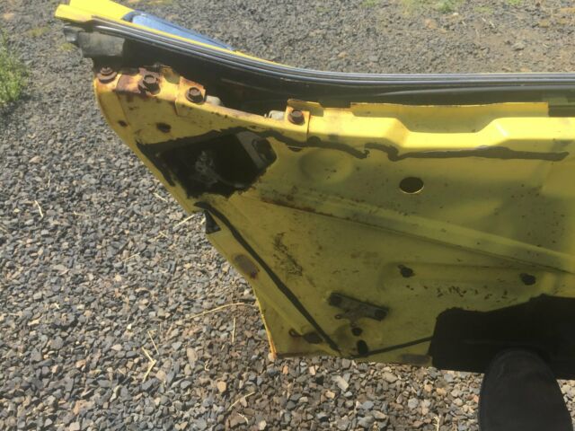 Yellow 1974 Chevrolet Corvette Coupe with Black interior