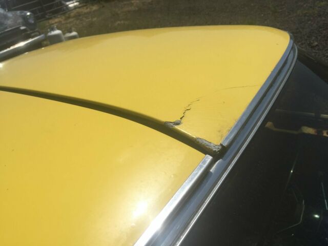 Yellow 1974 Chevrolet Corvette Coupe with Black interior