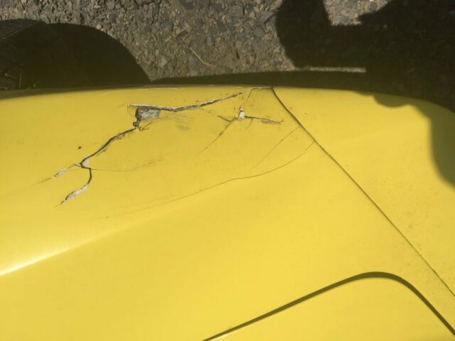 Yellow 1974 Chevrolet Corvette Coupe with Black interior