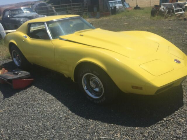 Yellow 1974 Chevrolet Corvette Coupe with Black interior