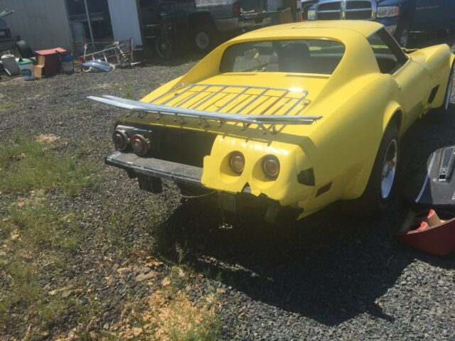 Yellow 1974 Chevrolet Corvette Coupe with Black interior