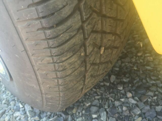 Yellow 1974 Chevrolet Corvette Coupe with Black interior