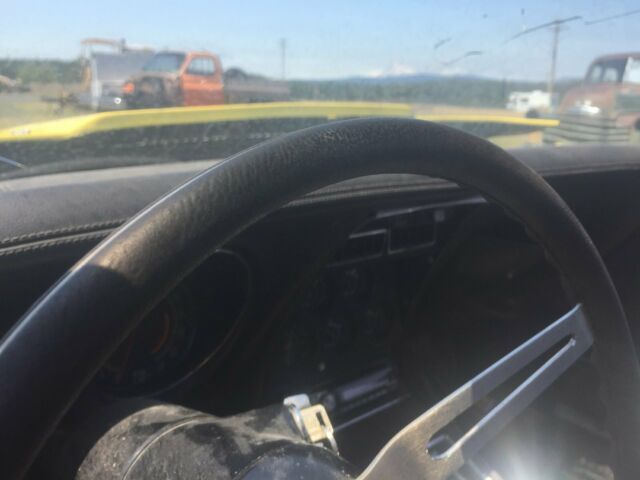 Yellow 1974 Chevrolet Corvette Coupe with Black interior