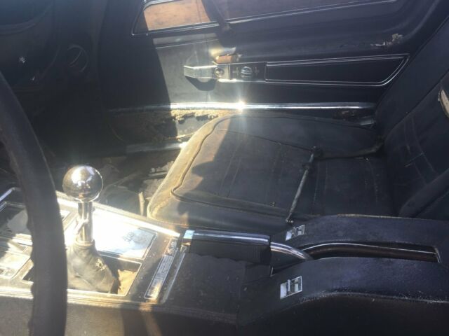 Yellow 1974 Chevrolet Corvette Coupe with Black interior