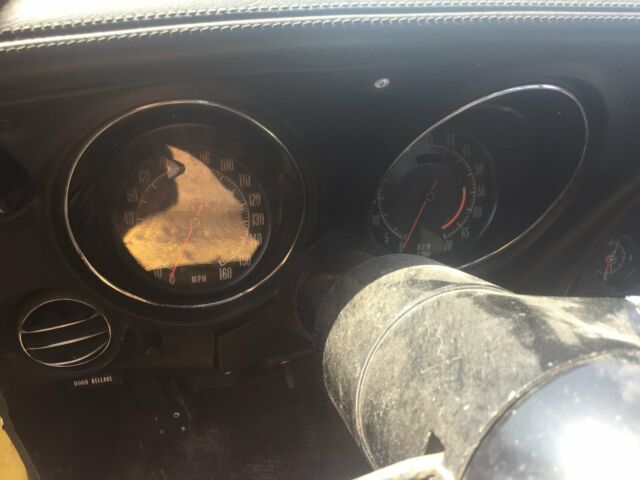 Yellow 1974 Chevrolet Corvette Coupe with Black interior