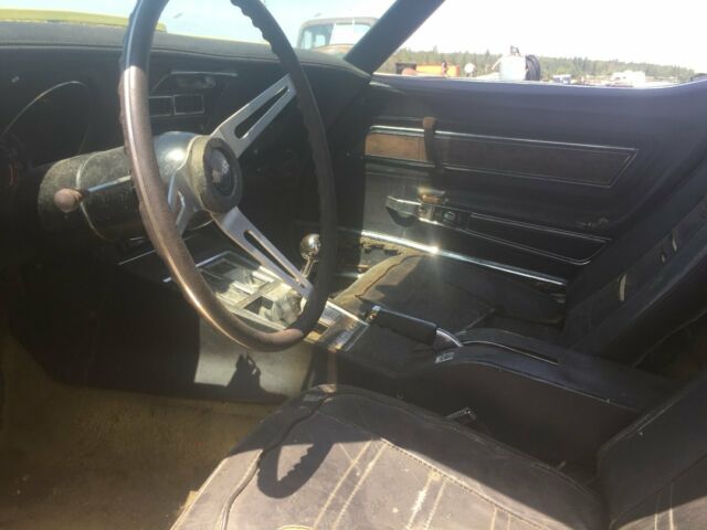 Yellow 1974 Chevrolet Corvette Coupe with Black interior