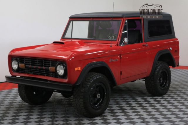 Red 1974 Ford Bronco with Black interior