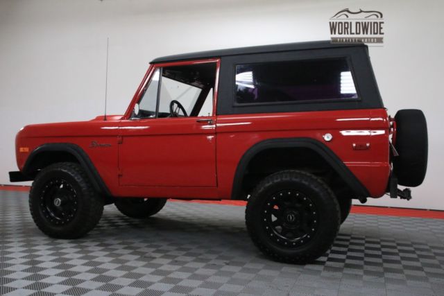 Red 1974 Ford Bronco with Black interior