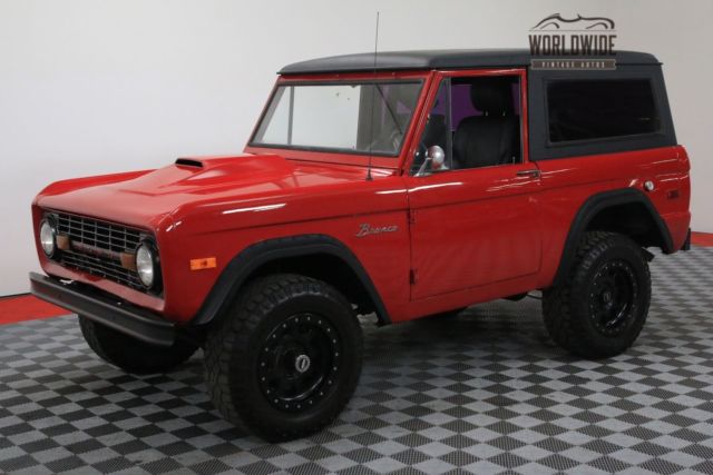 Red 1974 Ford Bronco with Black interior