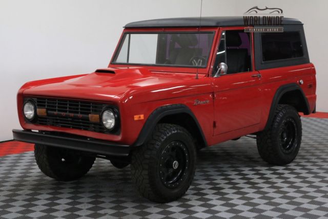 Red 1974 Ford Bronco with Black interior