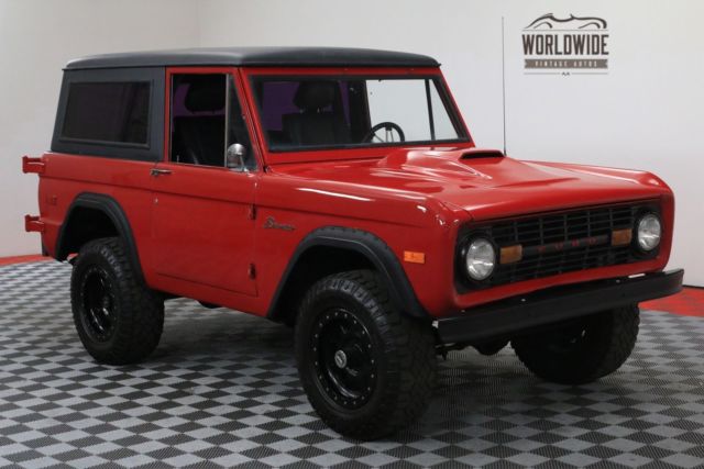 Red 1974 Ford Bronco with Black interior