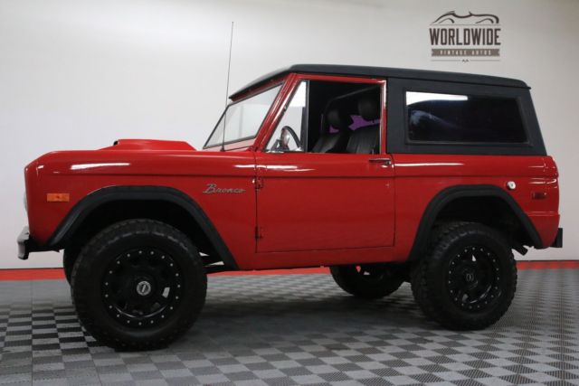 Red 1974 Ford Bronco with Black interior