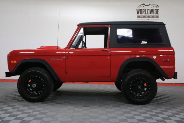 Red 1974 Ford Bronco with Black interior