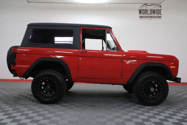 Red 1974 Ford Bronco with Black interior