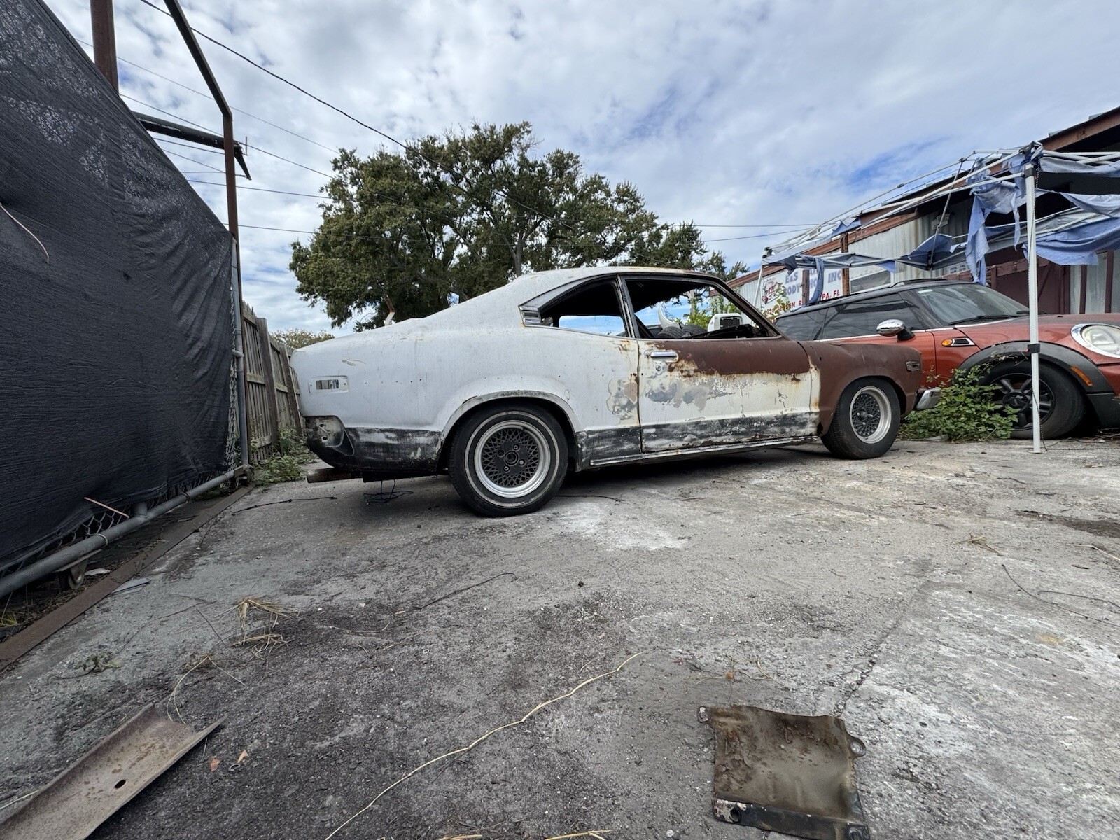 White 1976 Mazda RX-3 Compact with Black interior