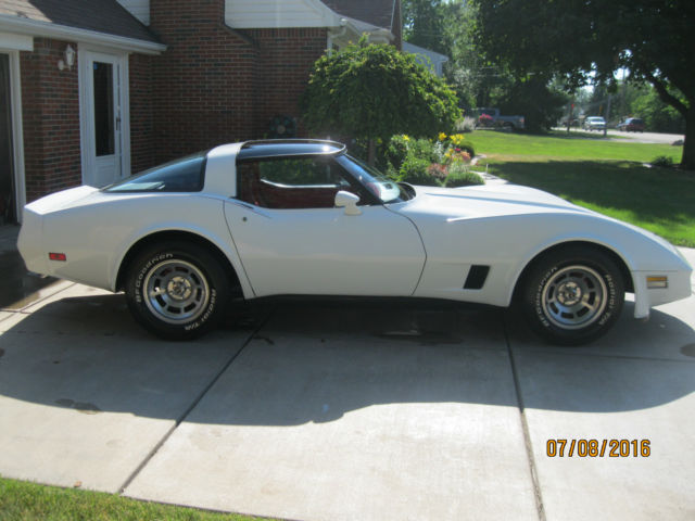 White 1981 Chevrolet Corvette Coupe with red interior