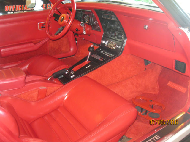 White 1981 Chevrolet Corvette Coupe with red interior