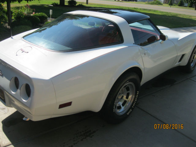 White 1981 Chevrolet Corvette Coupe with red interior